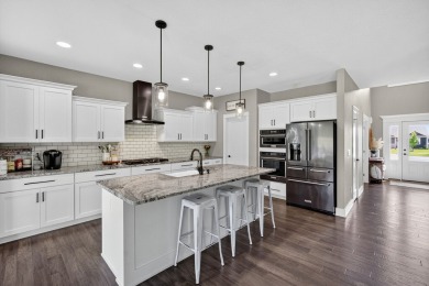 Welcome to 1150 Cardinal Drive-a thoughtfully designed, move-in on Tournament Club of Iowa in Iowa - for sale on GolfHomes.com, golf home, golf lot