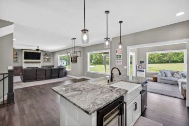 Welcome to 1150 Cardinal Drive-a thoughtfully designed, move-in on Tournament Club of Iowa in Iowa - for sale on GolfHomes.com, golf home, golf lot