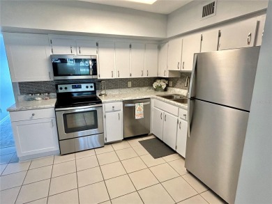 Well maintained and freshly painted first floor unit with many on On Top Of The World Golf Course in Florida - for sale on GolfHomes.com, golf home, golf lot