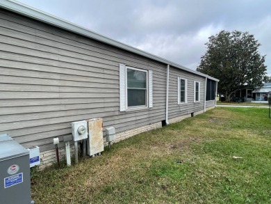 355 Putter Circle 2 bedroom 2 bath, 1344 SQ FT listed for $139 on Lake Henry Golf Club in Florida - for sale on GolfHomes.com, golf home, golf lot