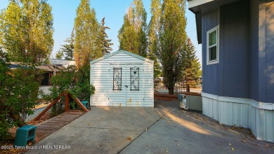 Discover a charming park model in the heart of Star Valley Ranch on Star Valley RV Golf Course in Wyoming - for sale on GolfHomes.com, golf home, golf lot