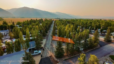 Discover a charming park model in the heart of Star Valley Ranch on Star Valley RV Golf Course in Wyoming - for sale on GolfHomes.com, golf home, golf lot