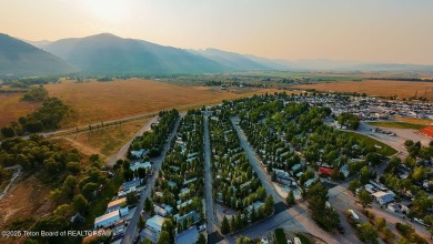 Discover a charming park model in the heart of Star Valley Ranch on Star Valley RV Golf Course in Wyoming - for sale on GolfHomes.com, golf home, golf lot