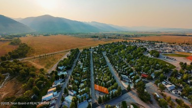 Discover a charming park model in the heart of Star Valley Ranch on Star Valley RV Golf Course in Wyoming - for sale on GolfHomes.com, golf home, golf lot