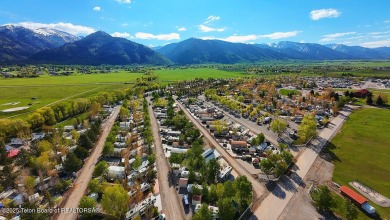 Discover a charming park model in the heart of Star Valley Ranch on Star Valley RV Golf Course in Wyoming - for sale on GolfHomes.com, golf home, golf lot