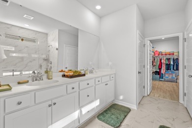 Built in 2022, this thoughtfully designed 3-bedroom, 2-bathroom on River Oaks Golf Plantation  in South Carolina - for sale on GolfHomes.com, golf home, golf lot