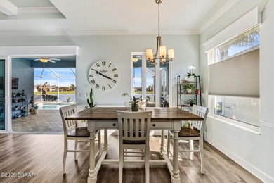 Step into a world of thoughtful beauty in this custom waterfront on Venetian Bay Golf Course in Florida - for sale on GolfHomes.com, golf home, golf lot