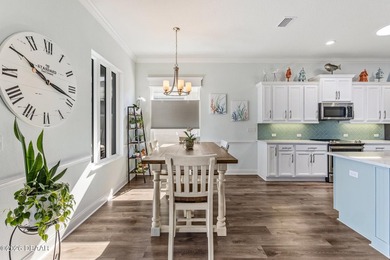 Step into a world of thoughtful beauty in this custom waterfront on Venetian Bay Golf Course in Florida - for sale on GolfHomes.com, golf home, golf lot