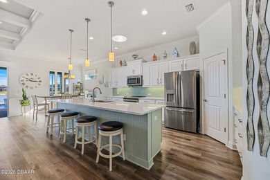 Step into a world of thoughtful beauty in this custom waterfront on Venetian Bay Golf Course in Florida - for sale on GolfHomes.com, golf home, golf lot