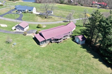 Perfectly positioned on the 9th green and situated on 2+ acres on Skyland Lakes Golf Course in Virginia - for sale on GolfHomes.com, golf home, golf lot