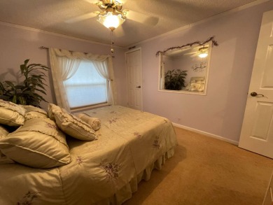 PRICE DROP...MOTIVATED SELLER! This beautifully well maintained on Lake Henry Golf Club in Florida - for sale on GolfHomes.com, golf home, golf lot