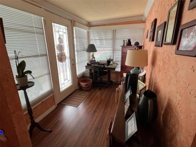 NEW REDUCED PRICE! Delight in the features of Palm Hill Country on Palm Hill Golf Club in Florida - for sale on GolfHomes.com, golf home, golf lot