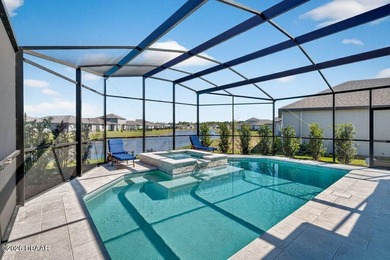 A total showstopper designed for the ultimate Florida lifestyle on LPGA International Golf Course in Florida - for sale on GolfHomes.com, golf home, golf lot
