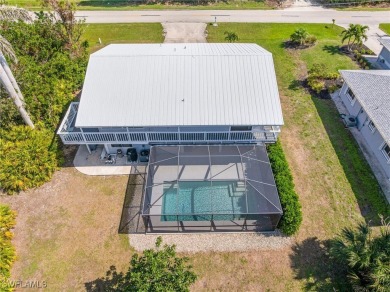 This classic Florida island home is located within the Alden on Alden Pines Golf Club in Florida - for sale on GolfHomes.com, golf home, golf lot