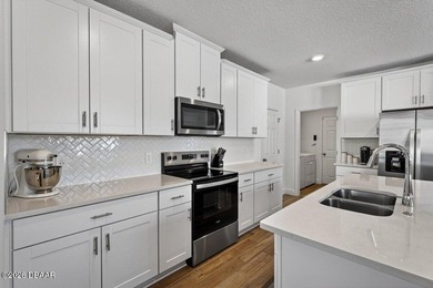 A total showstopper designed for the ultimate Florida lifestyle on LPGA International Golf Course in Florida - for sale on GolfHomes.com, golf home, golf lot