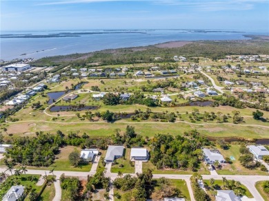 This classic Florida island home is located within the Alden on Alden Pines Golf Club in Florida - for sale on GolfHomes.com, golf home, golf lot