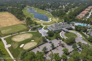 Nestled in the prestigious Jacksonville Golf & Country Club on Jacksonville Golf and Country Club in Florida - for sale on GolfHomes.com, golf home, golf lot