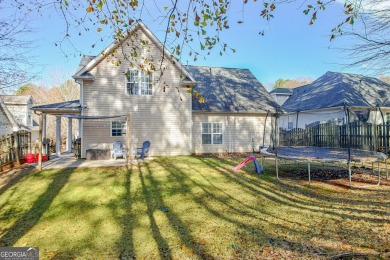 Cozy 2 story home with primary suite on the main. Home features on Summergrove Golf Club in Georgia - for sale on GolfHomes.com, golf home, golf lot