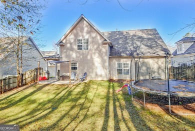 Cozy 2 story home with primary suite on the main. Home features on Summergrove Golf Club in Georgia - for sale on GolfHomes.com, golf home, golf lot