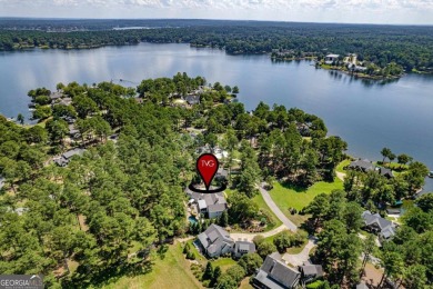 Tucked in the prestigious golf and lake community of Cuscowilla on The Golf Club at Cuscowilla in Georgia - for sale on GolfHomes.com, golf home, golf lot
