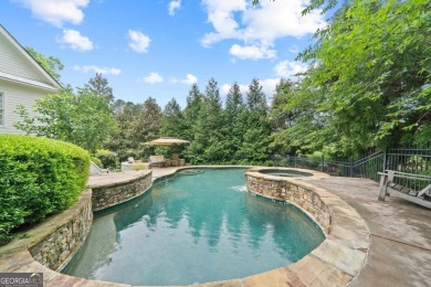 Tucked in the prestigious golf and lake community of Cuscowilla on The Golf Club at Cuscowilla in Georgia - for sale on GolfHomes.com, golf home, golf lot