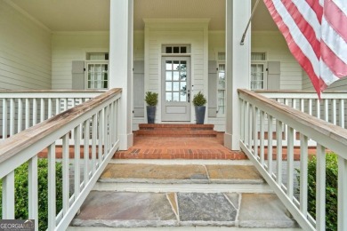 Tucked in the prestigious golf and lake community of Cuscowilla on The Golf Club at Cuscowilla in Georgia - for sale on GolfHomes.com, golf home, golf lot