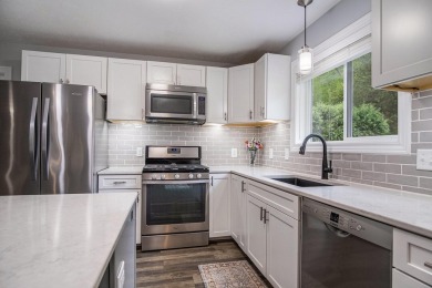 Built in 2014 and tastefully remodeled in 2020, this 4-bedroom on Centennial Country Club in Michigan - for sale on GolfHomes.com, golf home, golf lot