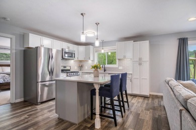 Built in 2014 and tastefully remodeled in 2020, this 4-bedroom on Centennial Country Club in Michigan - for sale on GolfHomes.com, golf home, golf lot
