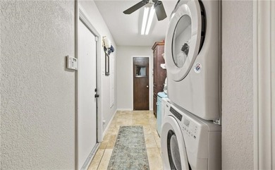 This stunning residence in Corpus Christi Country Club offers 4 on Corpus Christi Country Club Golf Course in Texas - for sale on GolfHomes.com, golf home, golf lot