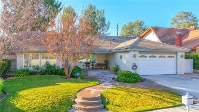 Beautiful 5 Bedroom, 3 Bath SINGLE-STORY home nestled in the on Vista Valencia Golf Course in California - for sale on GolfHomes.com, golf home, golf lot