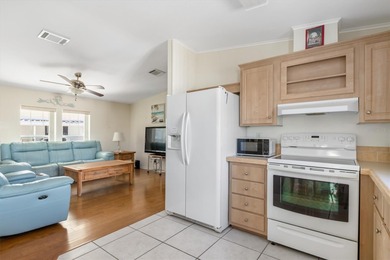 This beautifully maintained 2006 3-bedroom, 2-bath, 1 car on Kings Gate Golf Club in Florida - for sale on GolfHomes.com, golf home, golf lot