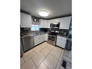 Welcome to this beautifully updated home located in the gated on Lake Fairways Country Club in Florida - for sale on GolfHomes.com, golf home, golf lot