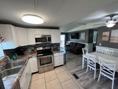 Welcome to this beautifully updated home located in the gated on Lake Fairways Country Club in Florida - for sale on GolfHomes.com, golf home, golf lot