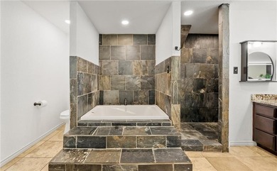 This stunning residence in Corpus Christi Country Club offers 4 on Corpus Christi Country Club Golf Course in Texas - for sale on GolfHomes.com, golf home, golf lot