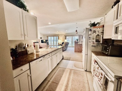 This spacious 4-bedroom, 2-bathroom home offers the best of both on Quest Golf Club in Michigan - for sale on GolfHomes.com, golf home, golf lot