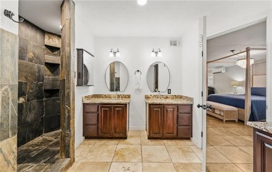 This stunning residence in Corpus Christi Country Club offers 4 on Corpus Christi Country Club Golf Course in Texas - for sale on GolfHomes.com, golf home, golf lot