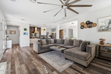 Stunning corner-lot home in Verrado welcomes you with an open on Verrado Golf Club  in Arizona - for sale on GolfHomes.com, golf home, golf lot
