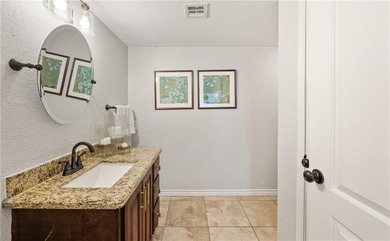 This stunning residence in Corpus Christi Country Club offers 4 on Corpus Christi Country Club Golf Course in Texas - for sale on GolfHomes.com, golf home, golf lot