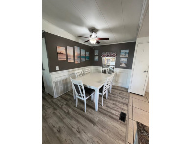Welcome to this beautifully updated home located in the gated on Lake Fairways Country Club in Florida - for sale on GolfHomes.com, golf home, golf lot