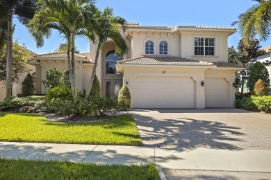 Stunning modern home set on a pristine Greg Norman golf course! on Jupiter Country Club in Florida - for sale on GolfHomes.com, golf home, golf lot