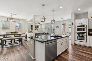 Stunning corner-lot home in Verrado welcomes you with an open on Verrado Golf Club  in Arizona - for sale on GolfHomes.com, golf home, golf lot