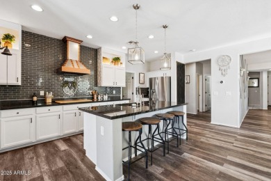 Stunning corner-lot home in Verrado welcomes you with an open on Verrado Golf Club  in Arizona - for sale on GolfHomes.com, golf home, golf lot