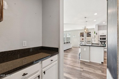 Stunning corner-lot home in Verrado welcomes you with an open on Verrado Golf Club  in Arizona - for sale on GolfHomes.com, golf home, golf lot