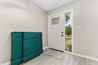 Beautifully updated home on a spacious corner lot, conveniently on Sammons Golf Links in Texas - for sale on GolfHomes.com, golf home, golf lot