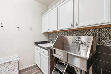 Stunning corner-lot home in Verrado welcomes you with an open on Verrado Golf Club  in Arizona - for sale on GolfHomes.com, golf home, golf lot