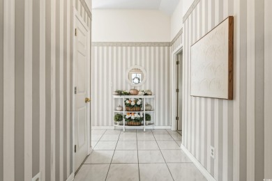 Step inside this charming, meticulously maintained 3-bedroom on Pine Lakes Country Club in South Carolina - for sale on GolfHomes.com, golf home, golf lot