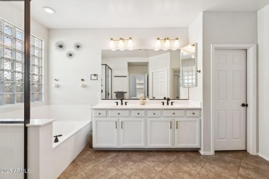 Stunning corner-lot home in Verrado welcomes you with an open on Verrado Golf Club  in Arizona - for sale on GolfHomes.com, golf home, golf lot