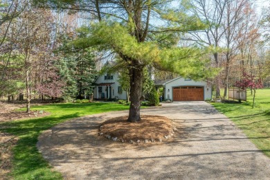 Charming Country Cottage with Modern Comforts and Serene Privacy on Canadian Lakes Country Club-The Royal Course in Michigan - for sale on GolfHomes.com, golf home, golf lot