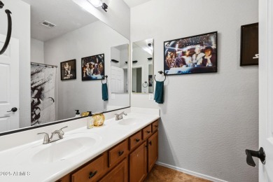 Stunning corner-lot home in Verrado welcomes you with an open on Verrado Golf Club  in Arizona - for sale on GolfHomes.com, golf home, golf lot