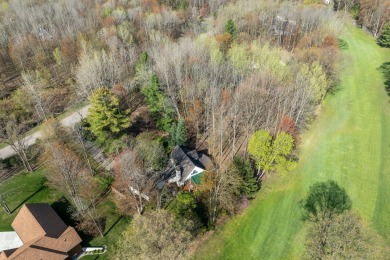 Charming Country Cottage with Modern Comforts and Serene Privacy on Canadian Lakes Country Club-The Royal Course in Michigan - for sale on GolfHomes.com, golf home, golf lot